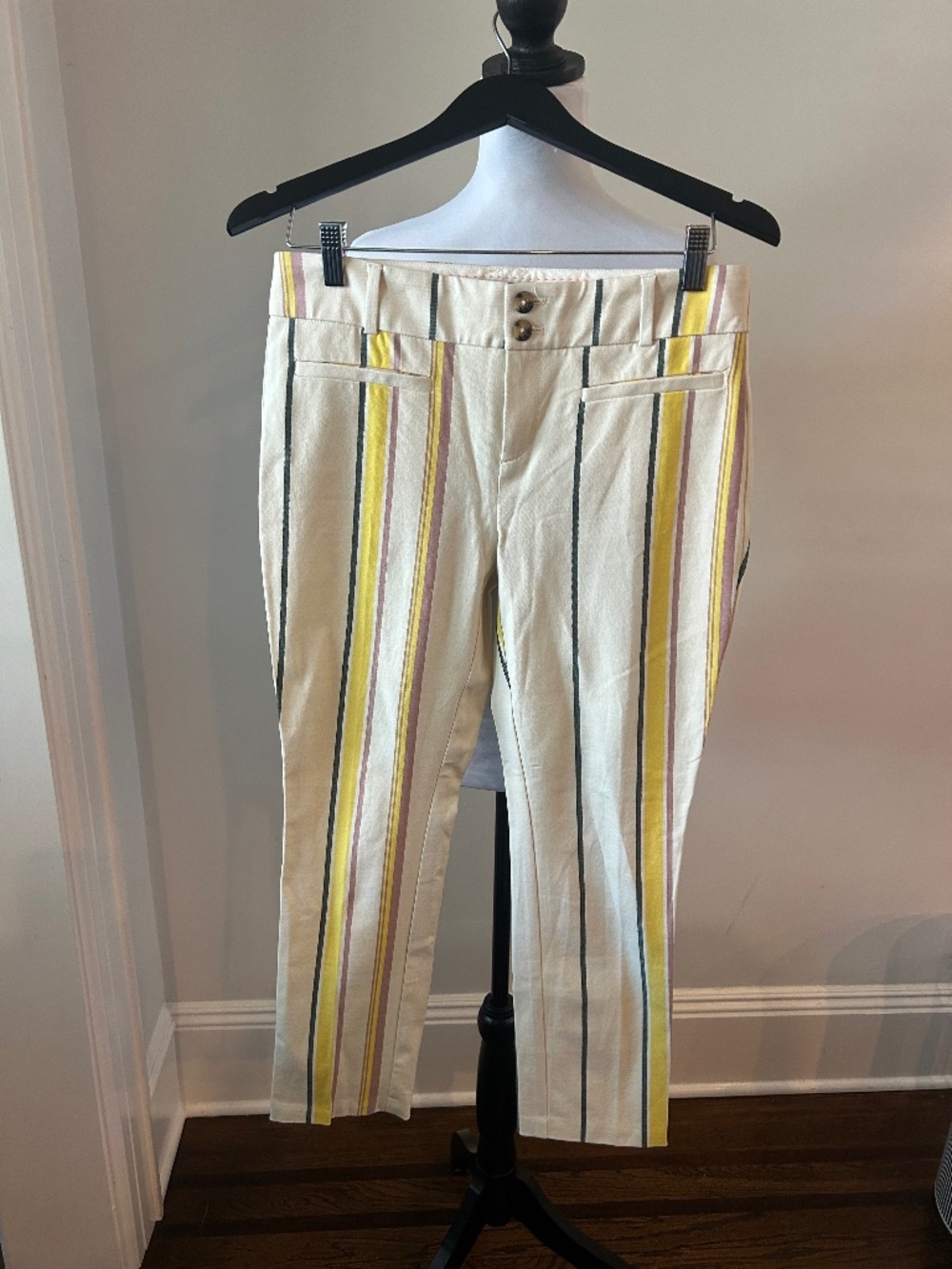 Anthropologie cream striped slim-cut pants with vertical stripes